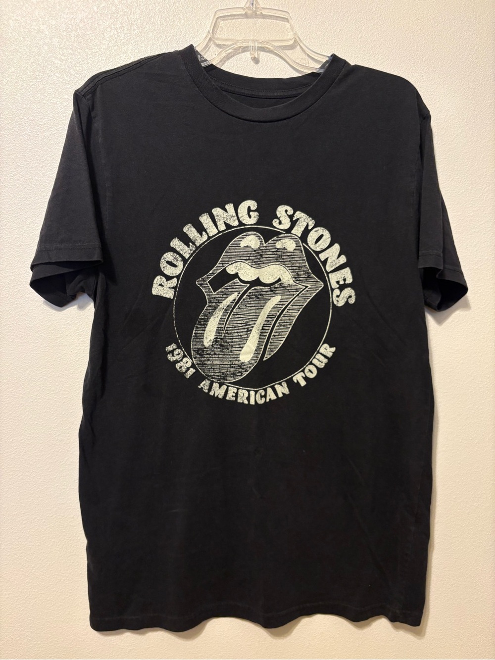the Rolling Stones Black Graphic Tee with White Tongue Logo